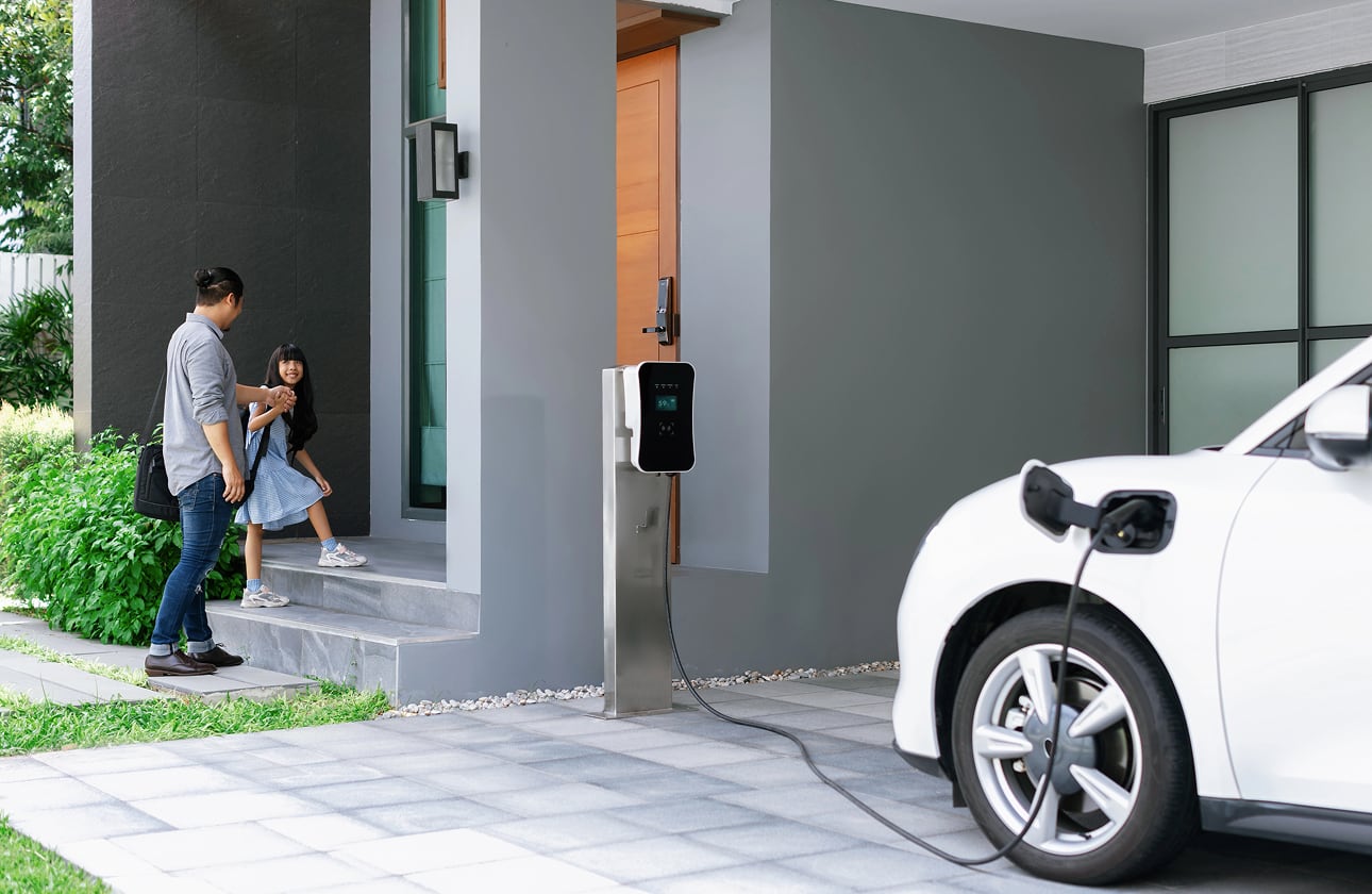 car charging in driveway
