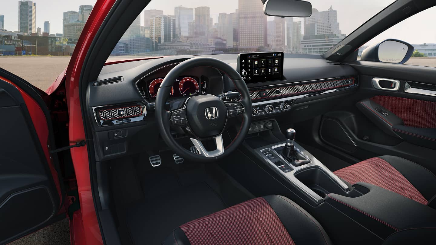 interior view of steering wheel and front seats in honda civic si 