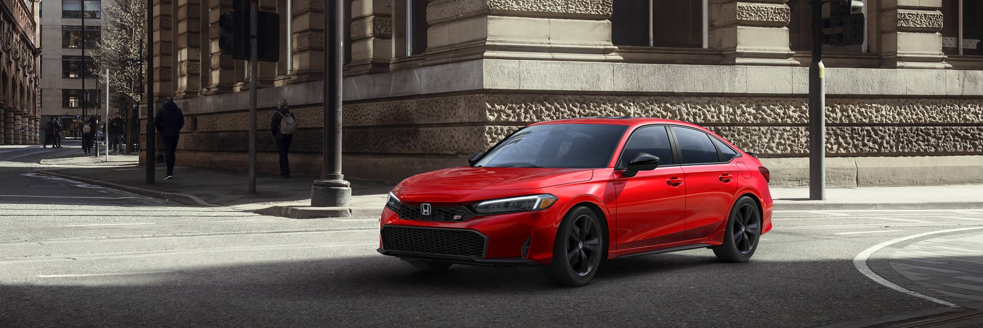 red 2026 honda civic si parked on road