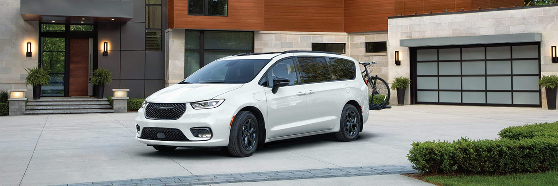 2026 chrysler pacifica plug-in hybrid parked in driveway