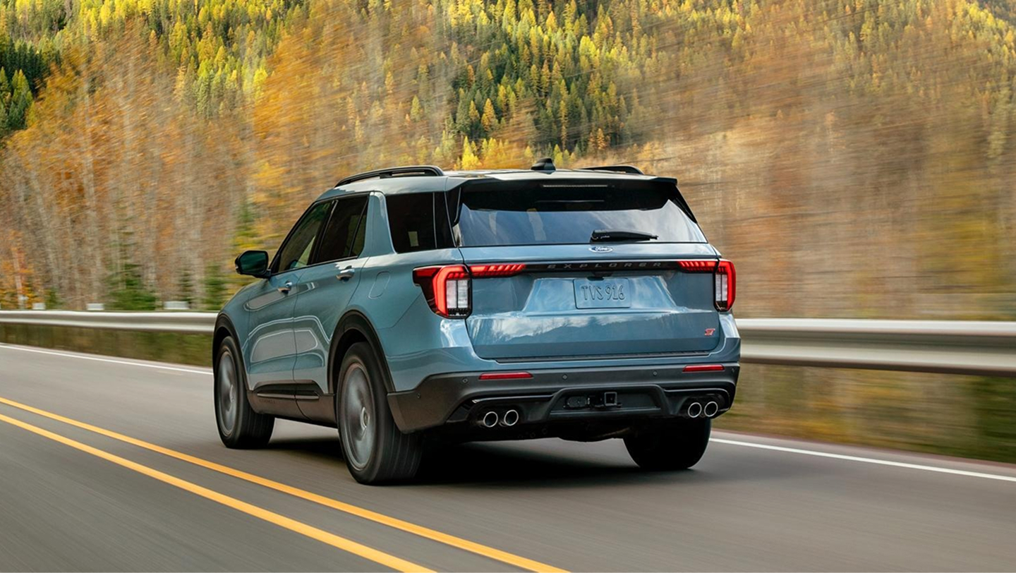 rear view of 2026 ford explorer driving