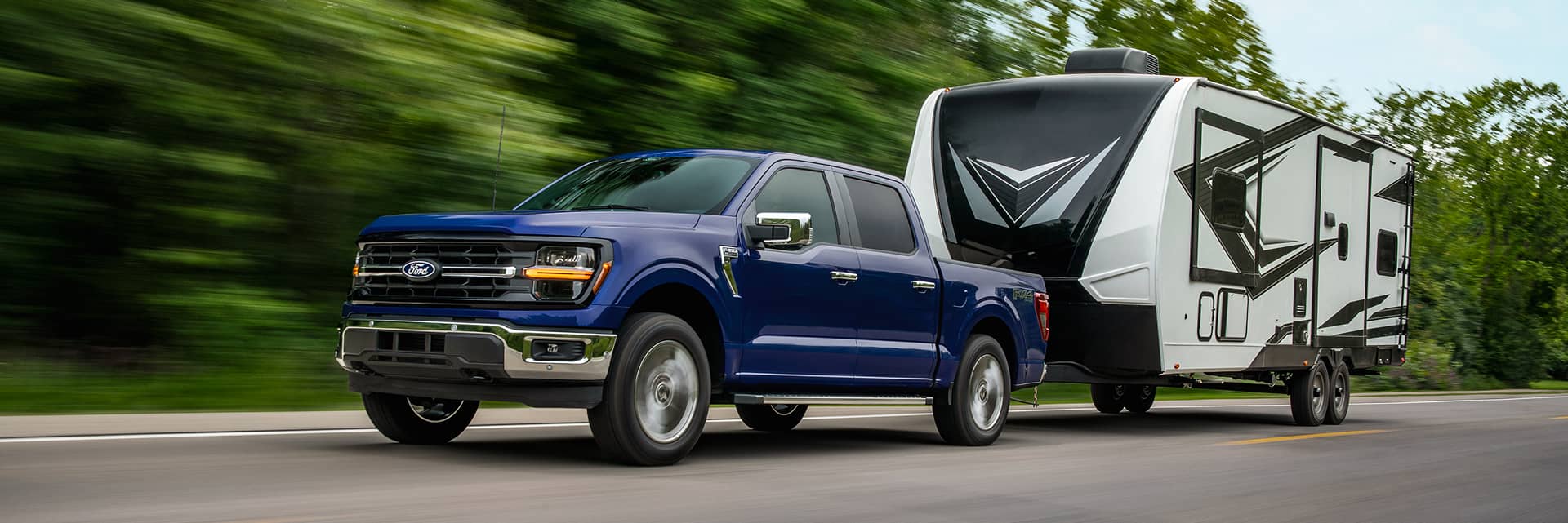 ford f-150 trailing driving on road