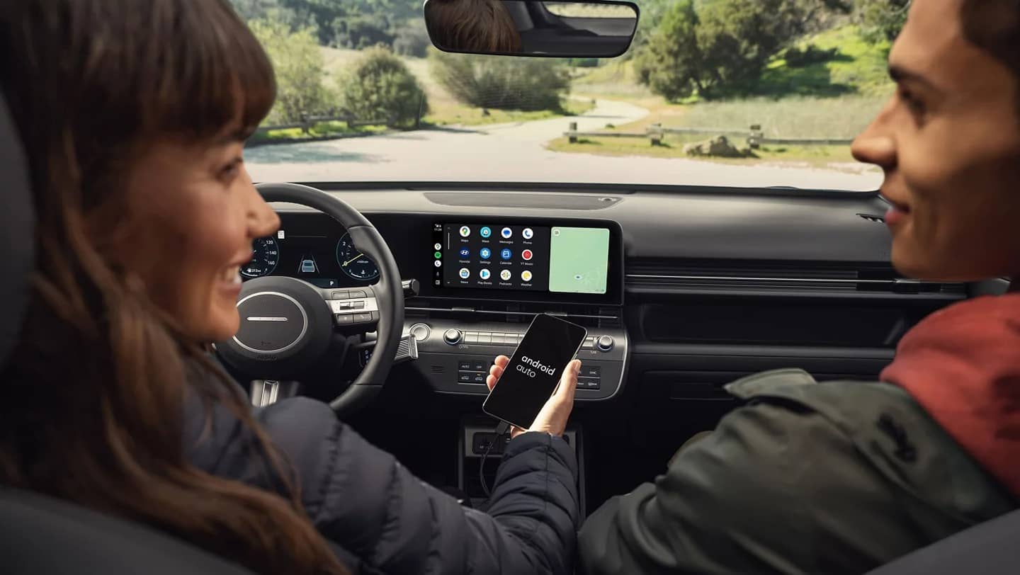 couple sitting inside 2026 kona