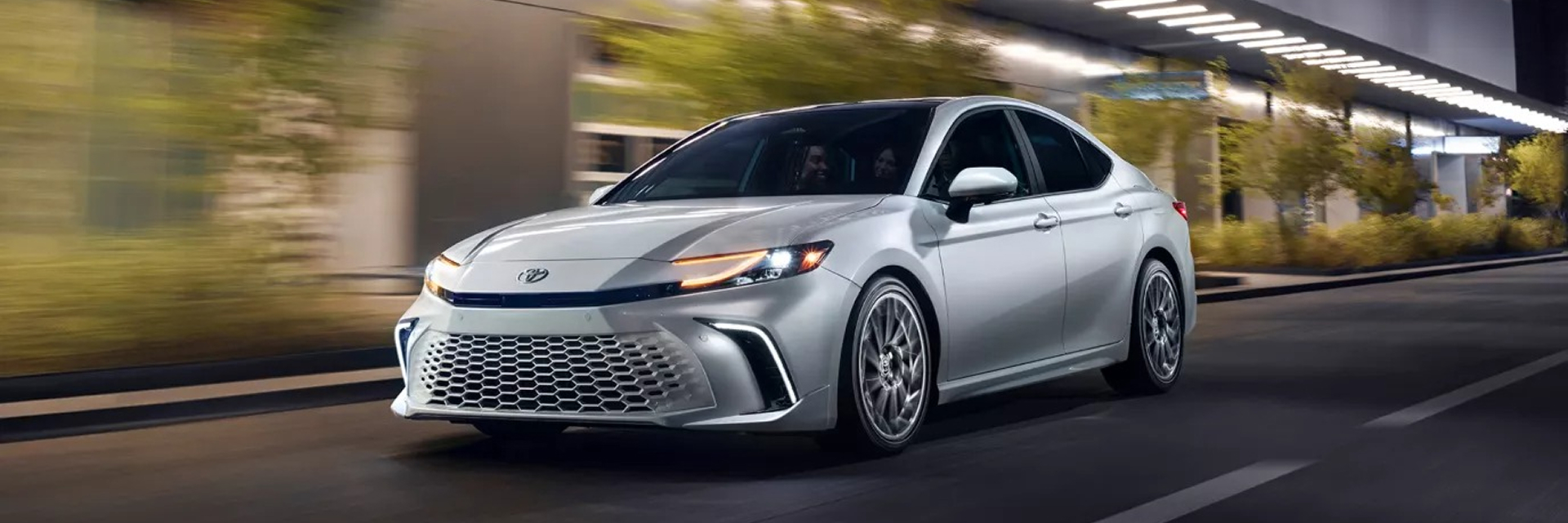 2026 toyota camry driving on road